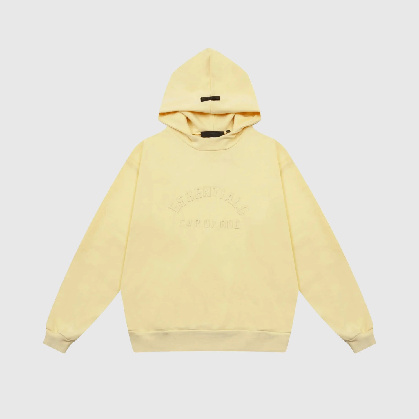 Fear of God Essentials Garden Yellow hoodie front view with rubberized black bar branding