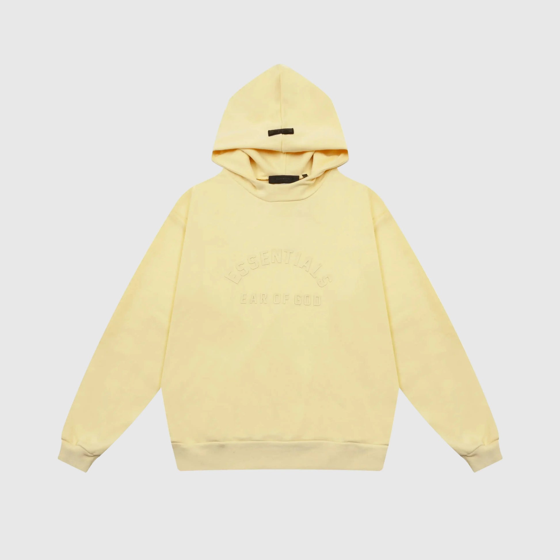 Fear of God Essentials Garden Yellow hoodie front view with rubberized black bar branding