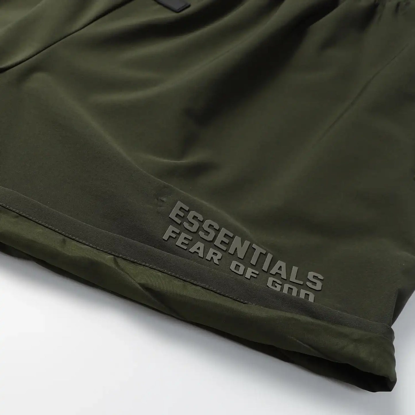 Fear of God Essentials Hemlock green fleece shorts with tonal logo and drawstring waistband