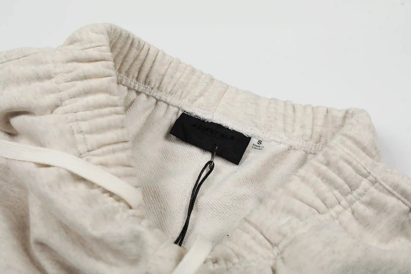 Fear of God Essentials Shorts – Cream Fleece