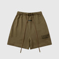 side view of Essentials brown everyday shorts by Fear of God