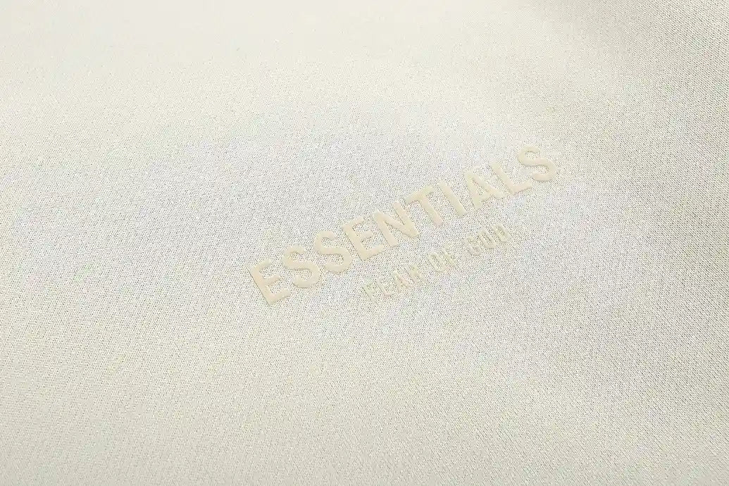 Rib-knit collar detail on Essentials ash grey sweatshirt