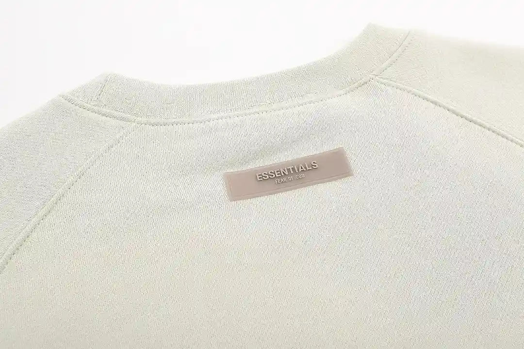 Rib-knit cuff and waist hem detail Essentials crewneck sweatshirt