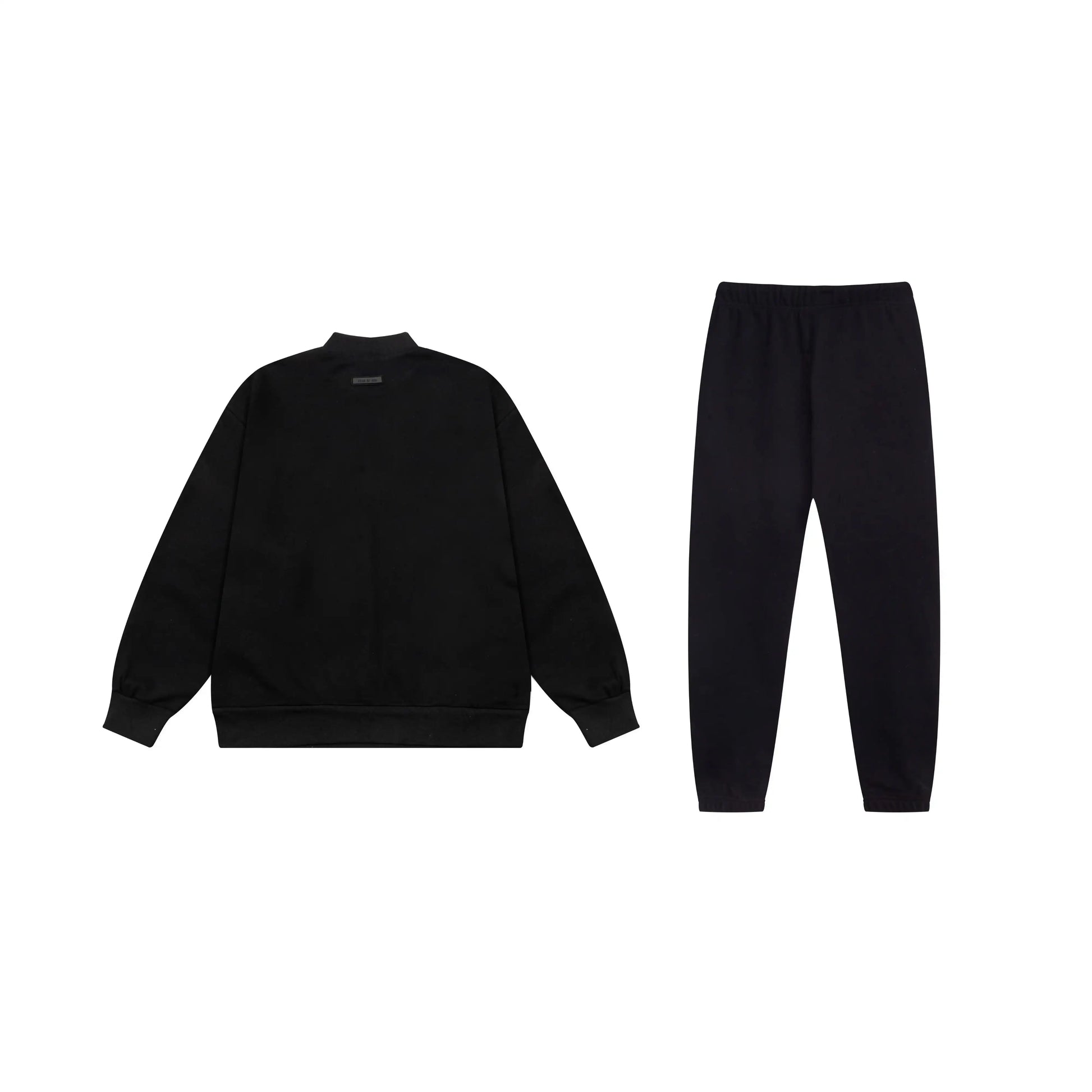 Essentials tracksuit black full set angled view relaxed fit