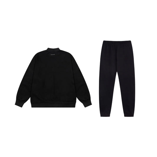 Essentials tracksuit black full set angled view relaxed fit