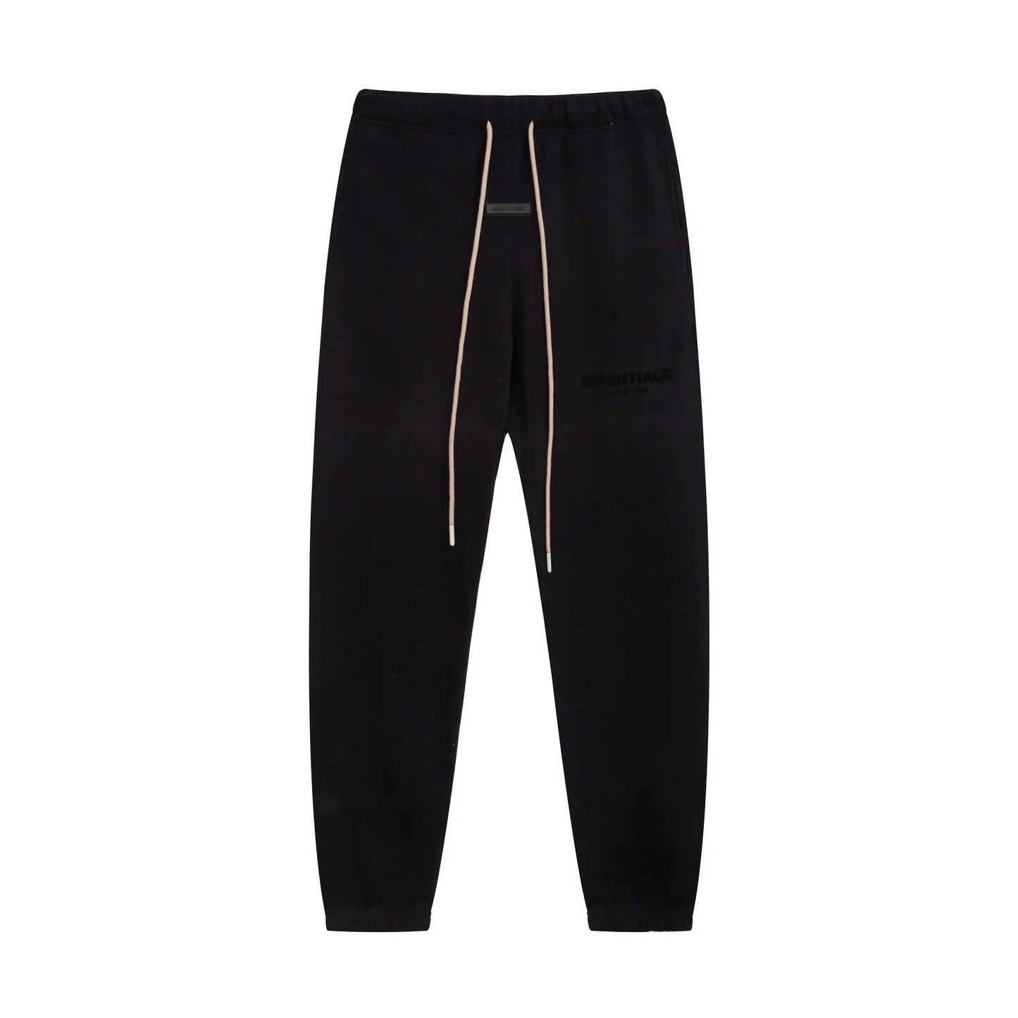 Black Essentials joggers soft-touch rubberized logo on leg close-up