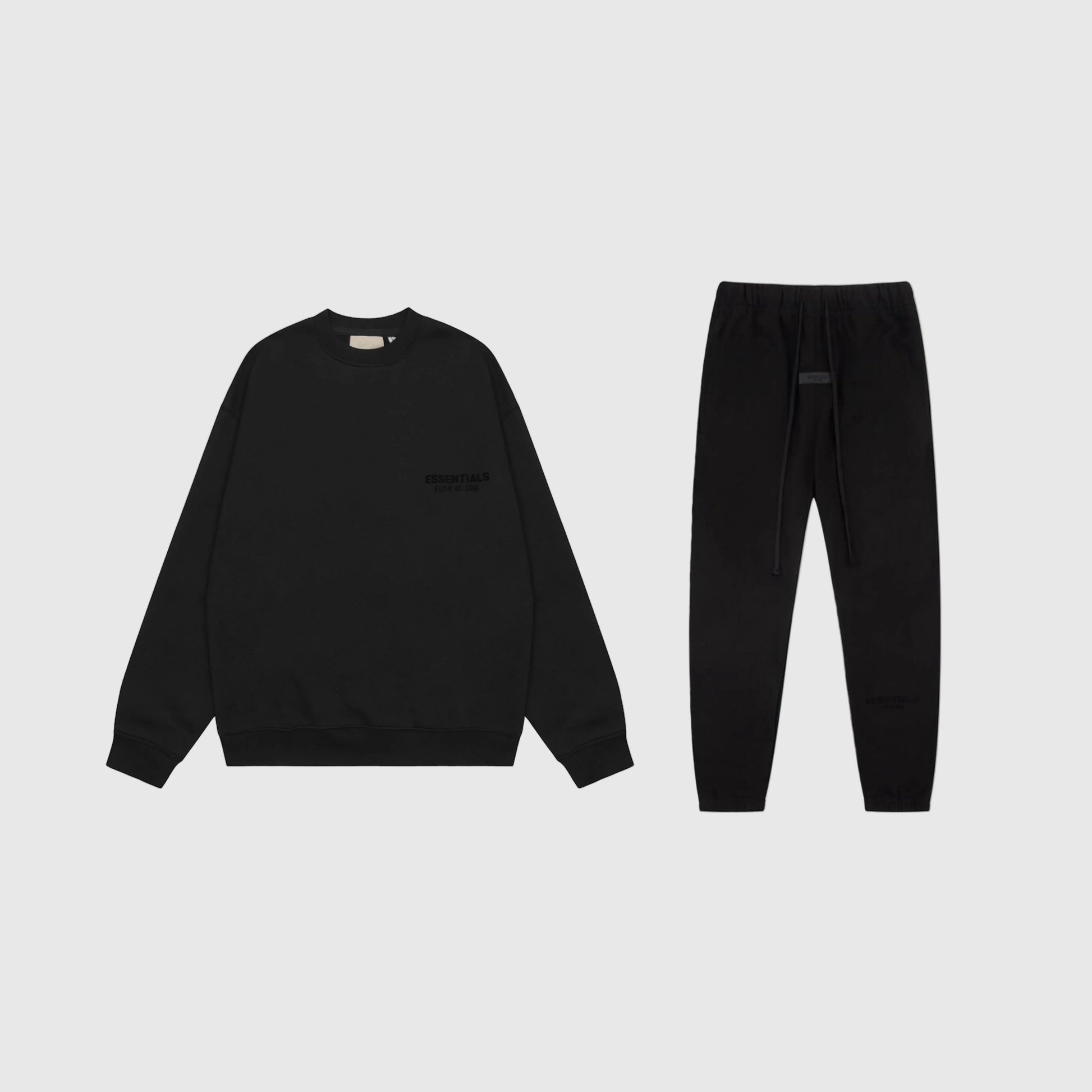 Fear of God Essentials black tracksuit set front view hoodie top and joggers