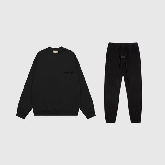 Fear of God Essentials black tracksuit set front view hoodie top and joggers