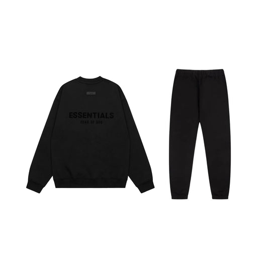 Essentials tracksuit black full set angled view relaxed fit