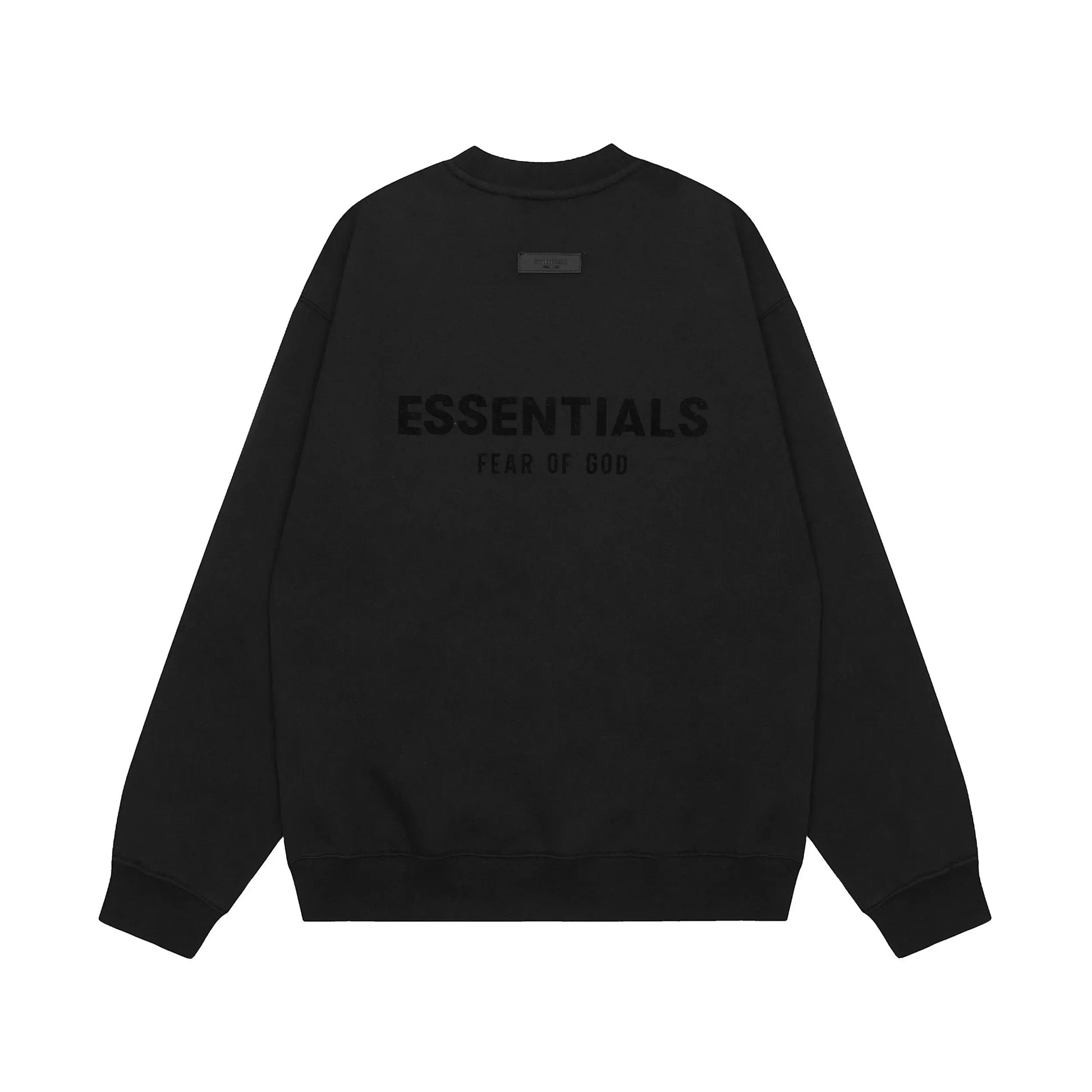 Black Essentials joggers soft-touch rubberized logo on leg close-up