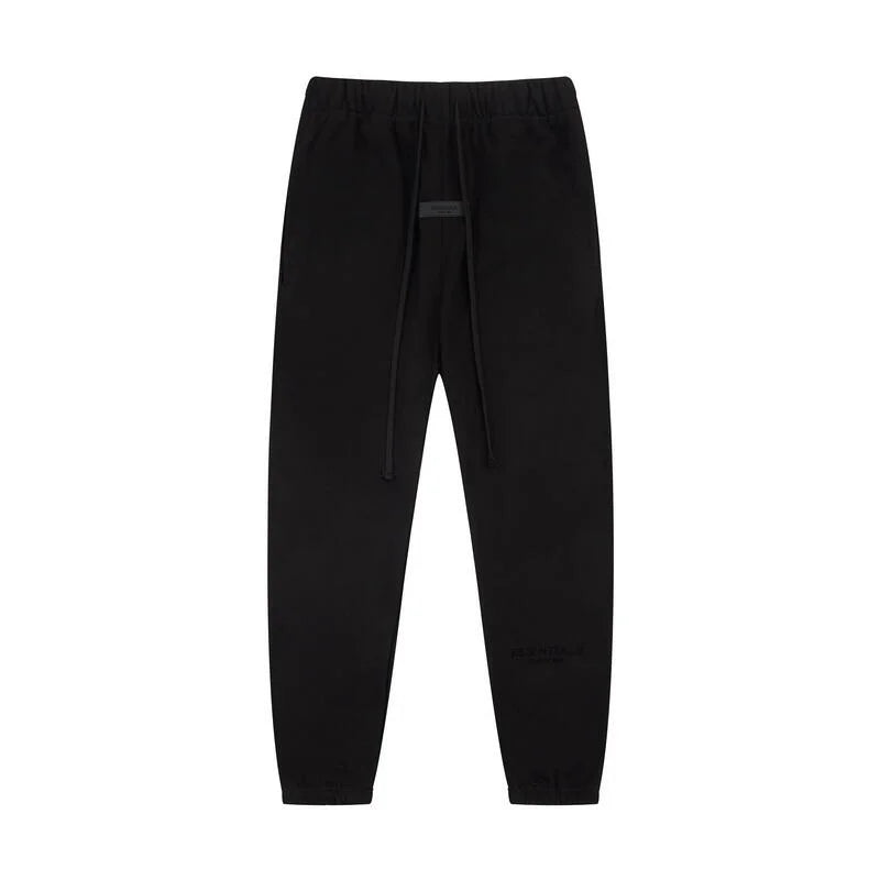 Fear of God Essentials black tracksuit set back view hood and joggers