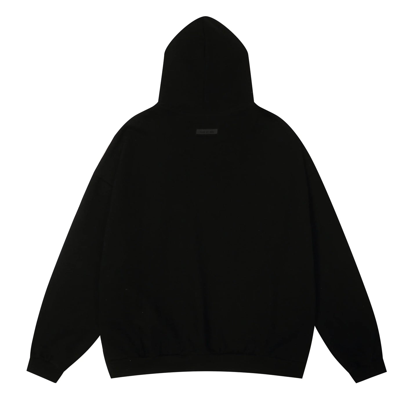 Black Essentials joggers soft-touch rubberized logo on leg close-up