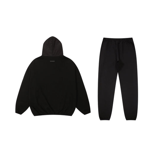 Essentials black daily comfort fleece hoodie with soft interior detail by Fear Of God