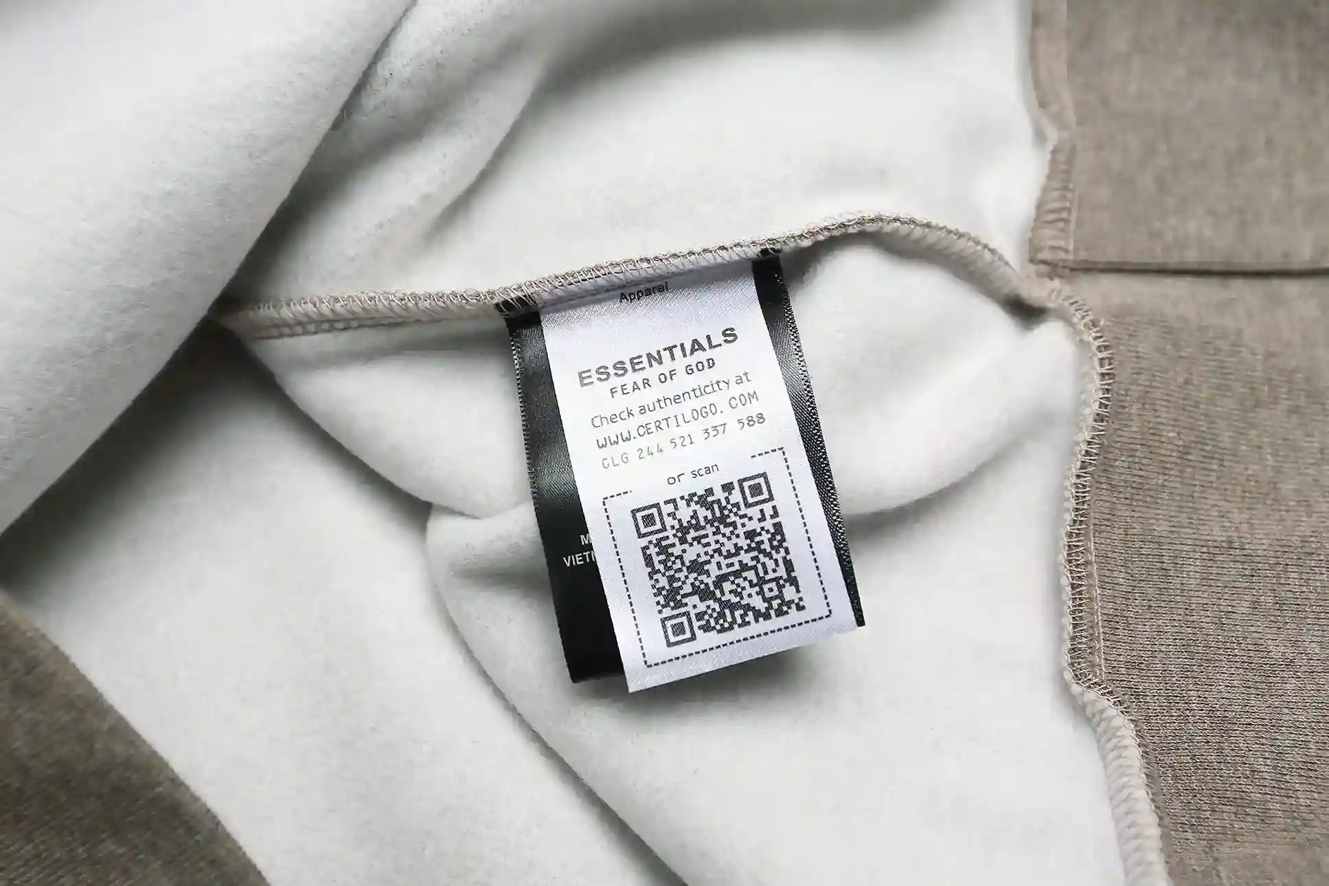 Essentials Dark Heather Oatmeal pullover hoodie back view – Fear of God