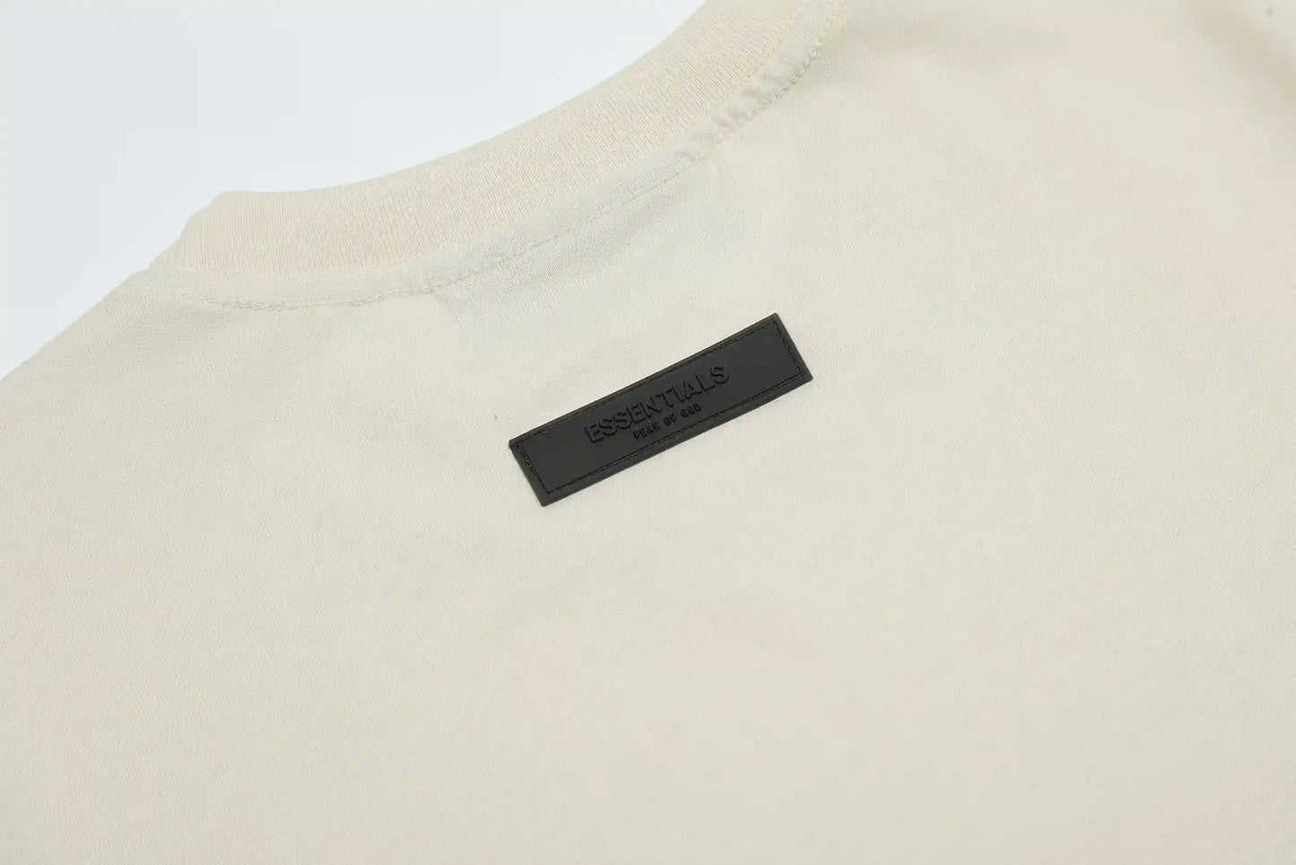 
Classic crew neckline on essentials egg shell relaxed t-shirt by Fear of God