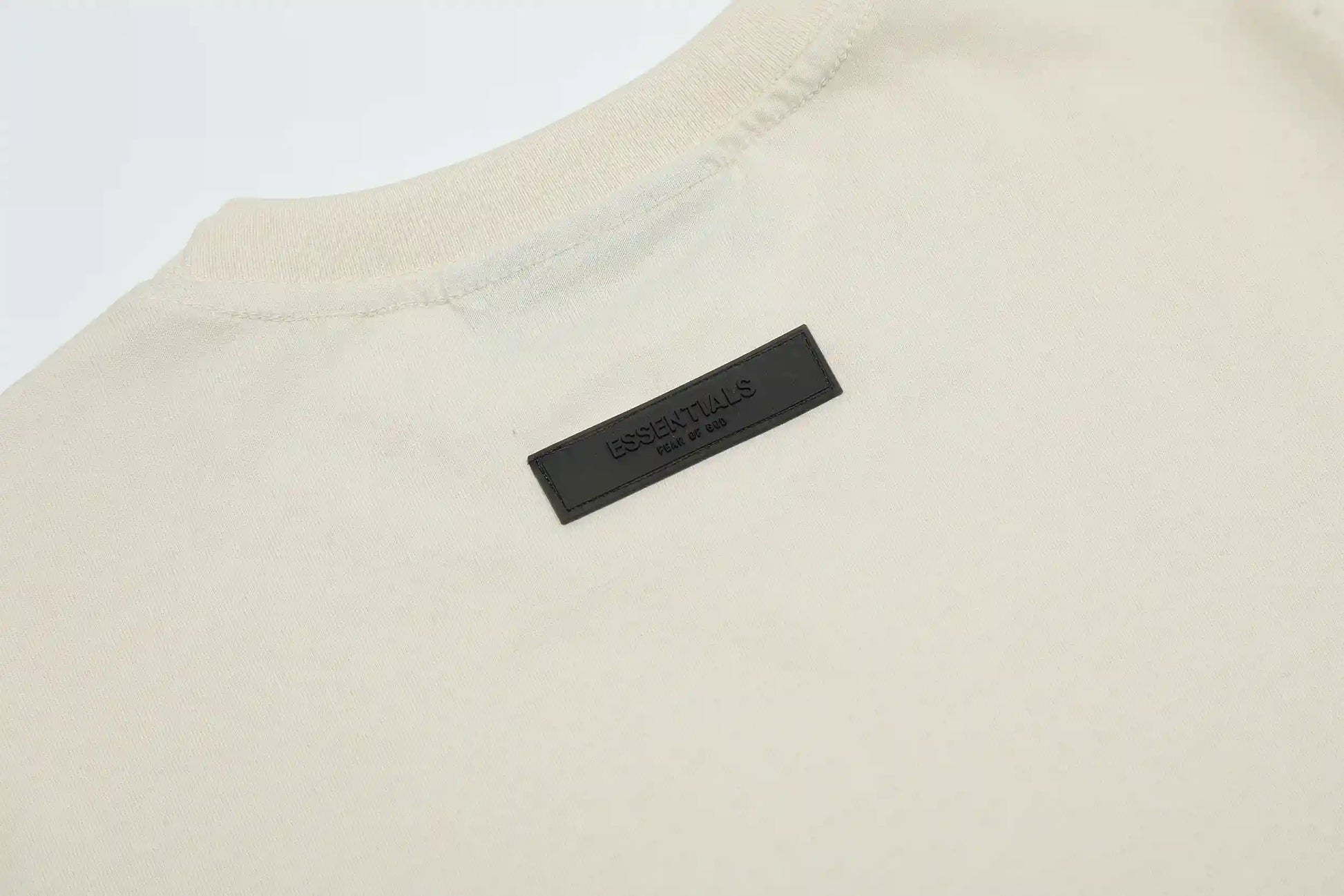 
Classic crew neckline on essentials egg shell relaxed t-shirt by Fear of God