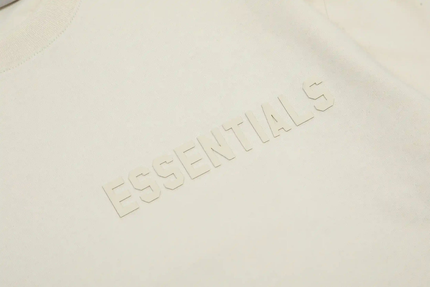 Everyday casual styling with essentials egg shell relaxed t-shirt by Fear of God