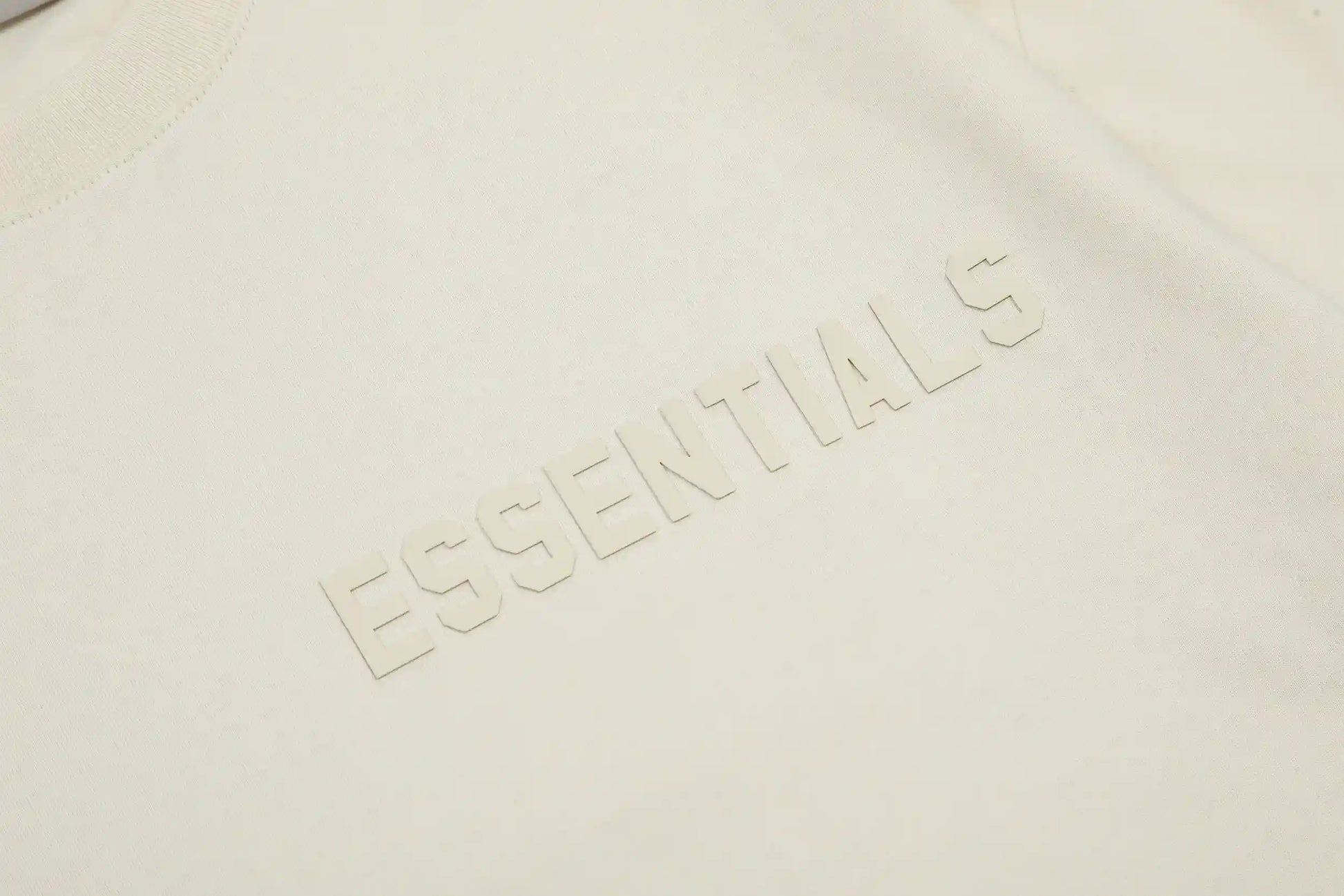 Everyday casual styling with essentials egg shell relaxed t-shirt by Fear of God