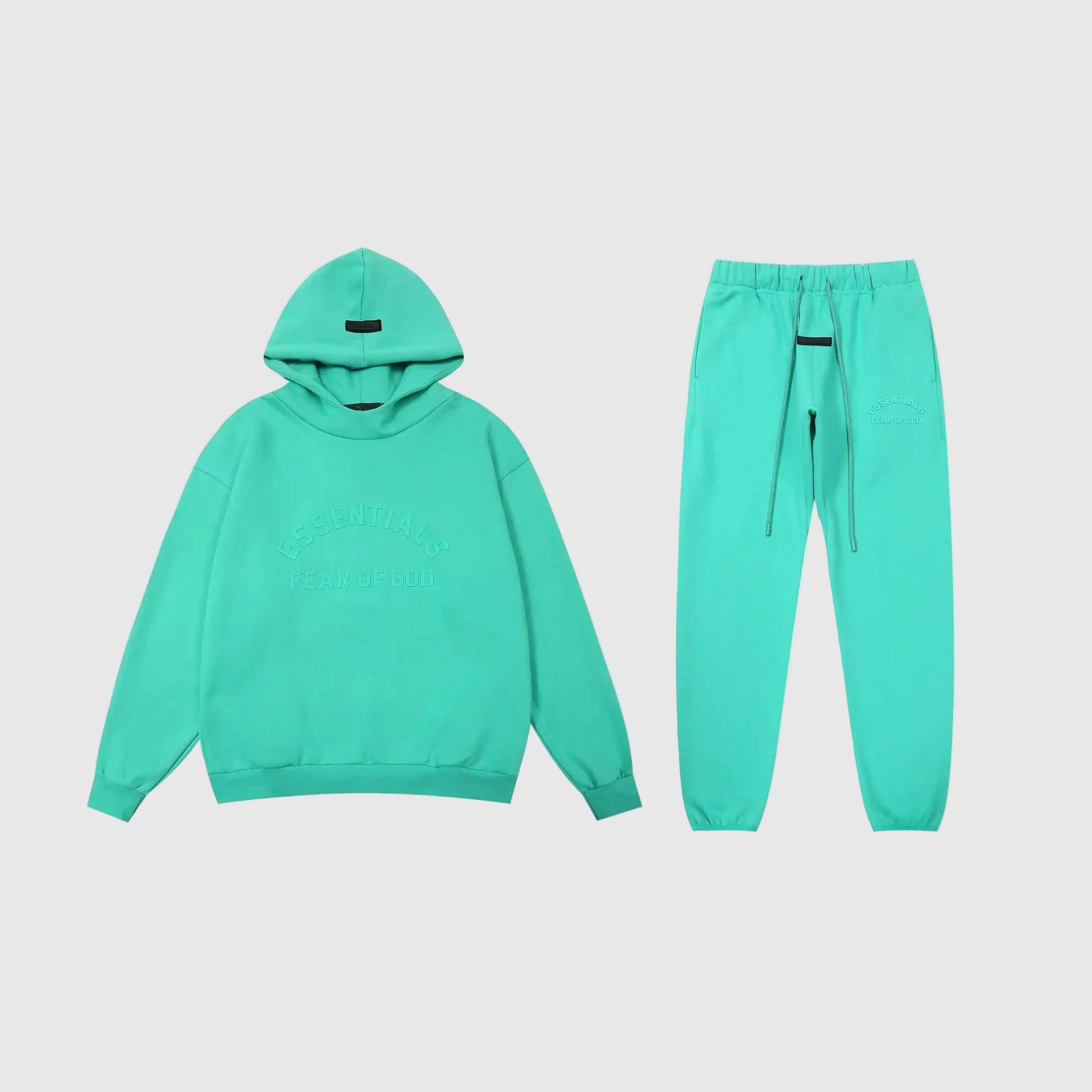 Fear of God Essentials aqua green tracksuit set front view hoodie and joggers