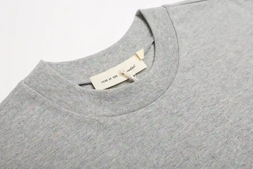 ESSENTIALS Signature 90s Light Grey Tee 