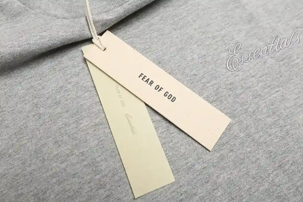 ESSENTIALS Signature 90s Light Grey Tee 