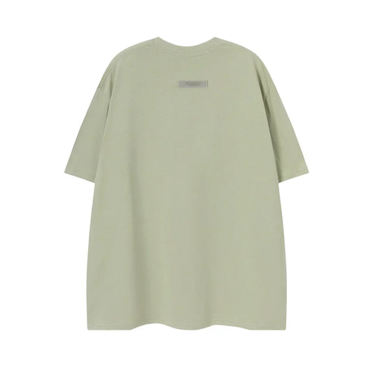 Mint green tee by Fear of God relaxed fit essentials top