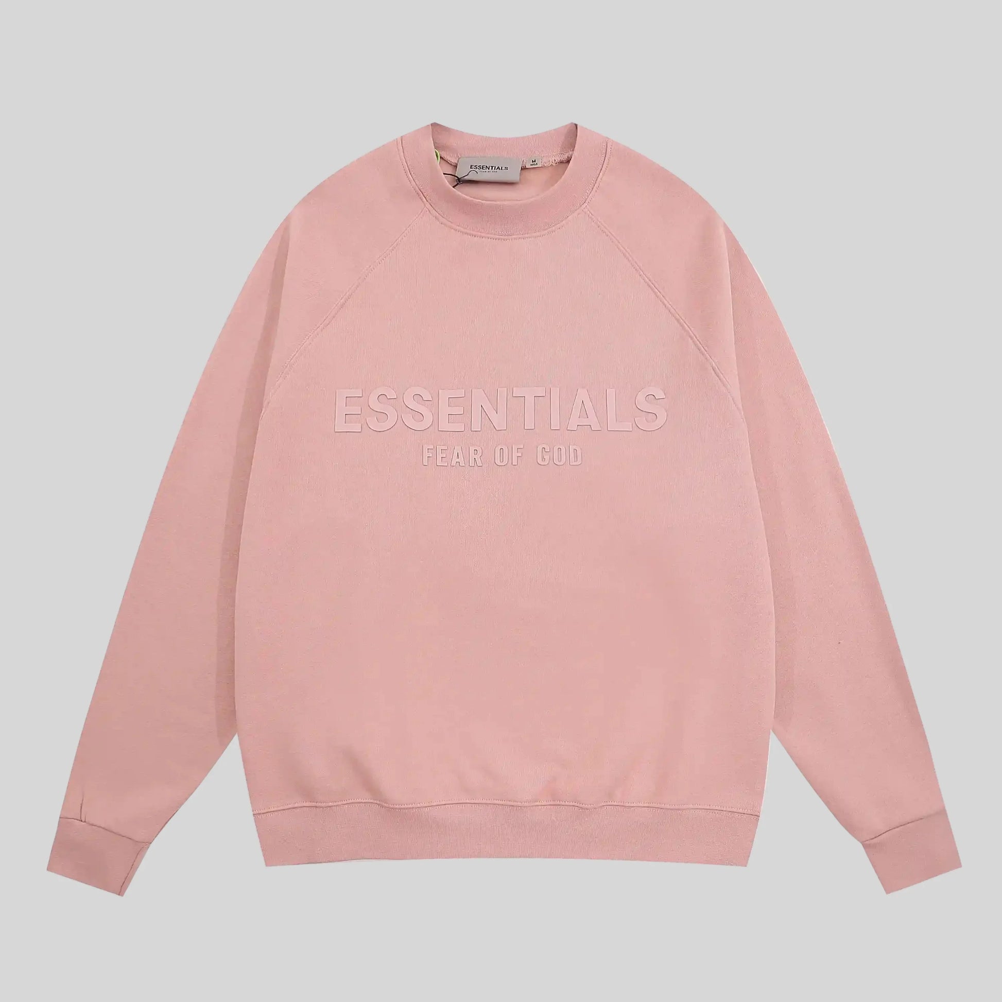 Fear of God Essentials pink sweatshirt front view classic fit crewneck