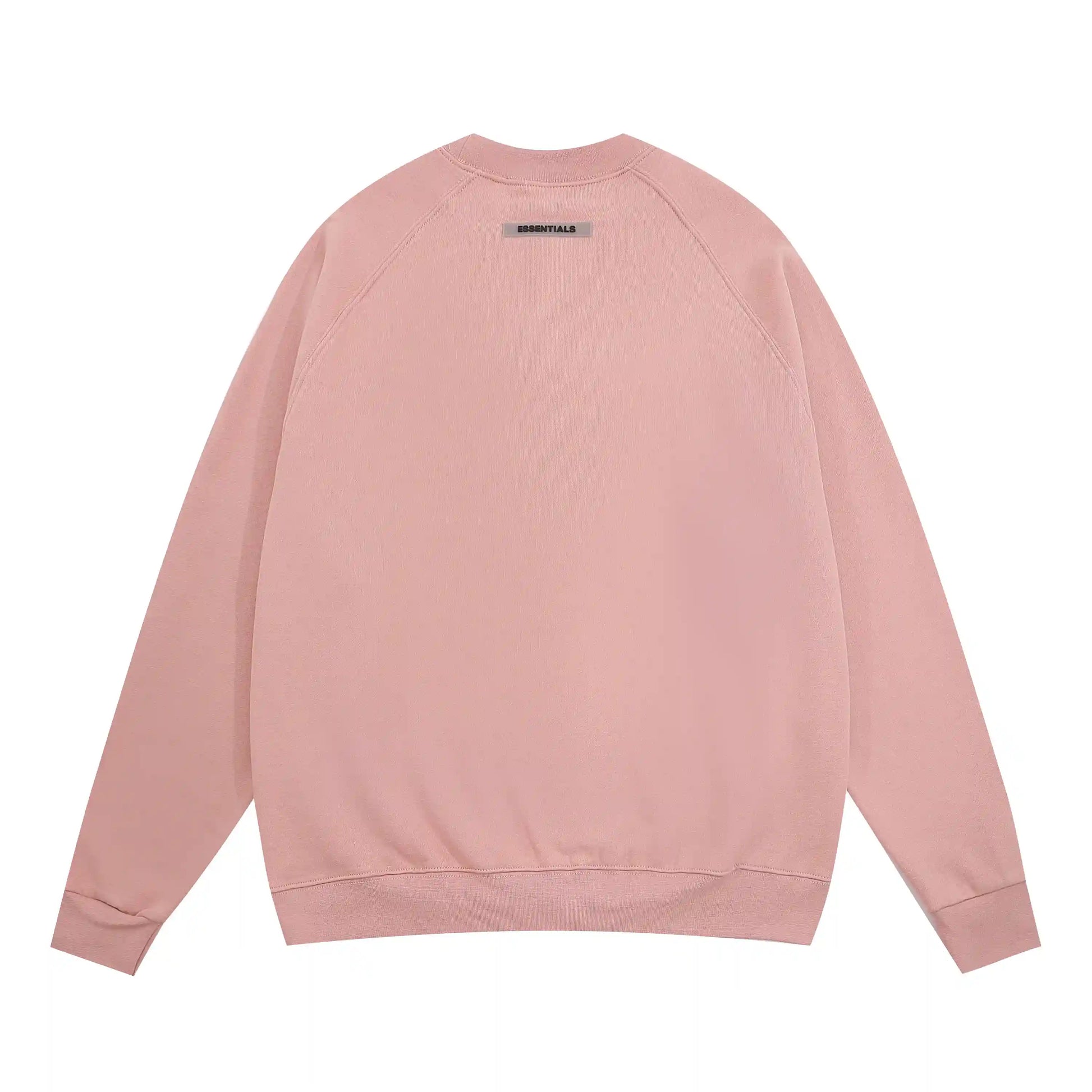 Alt: Fear of God Essentials pink sweatshirt back view with Essentials logo