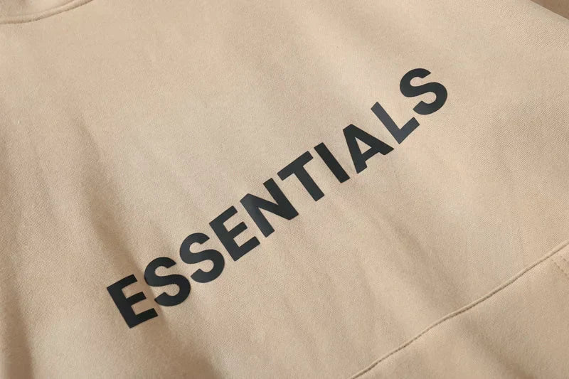 essentials oversized brown hoodie front view minimalist design