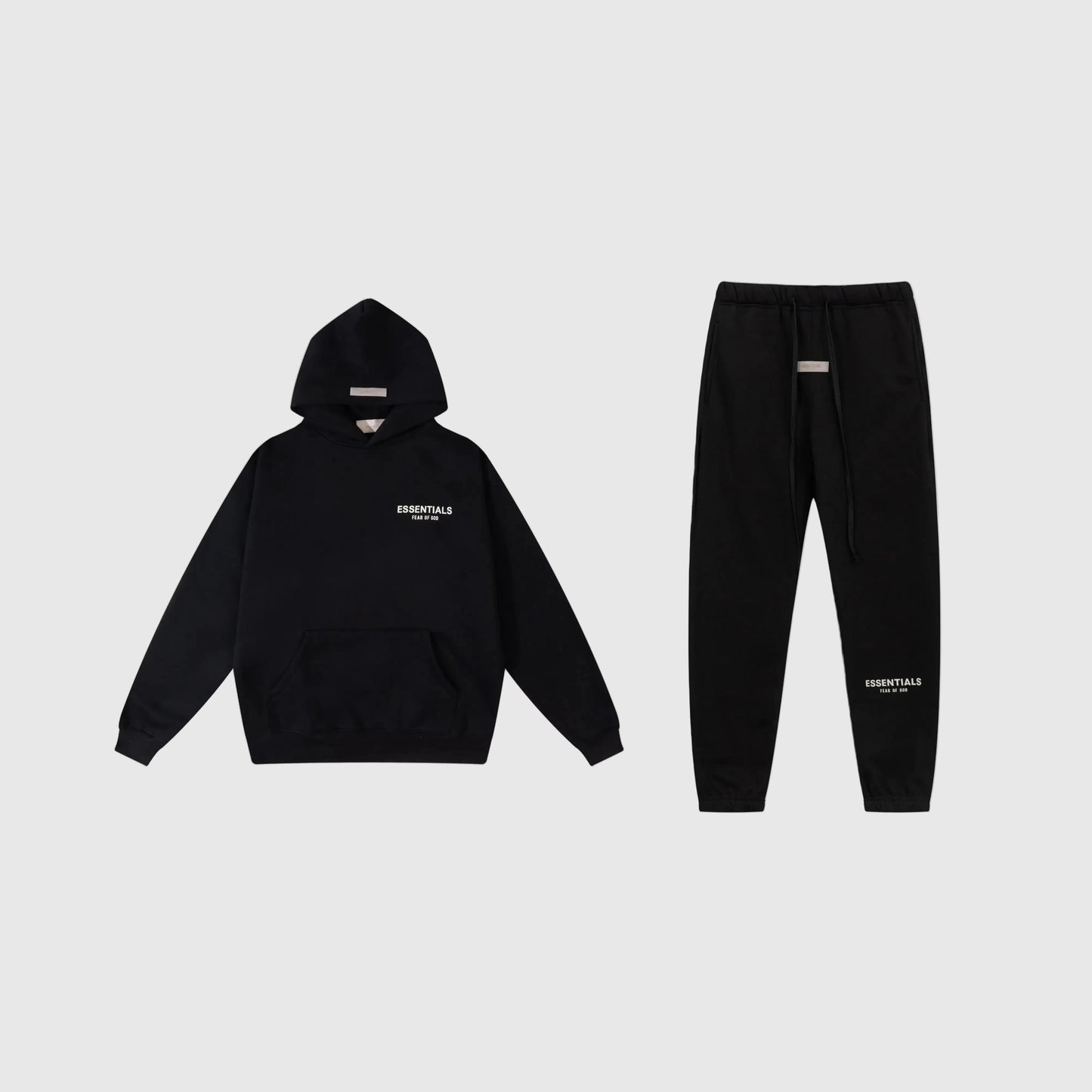 Fear of God Essentials black tracksuit set front view hoodie and joggers