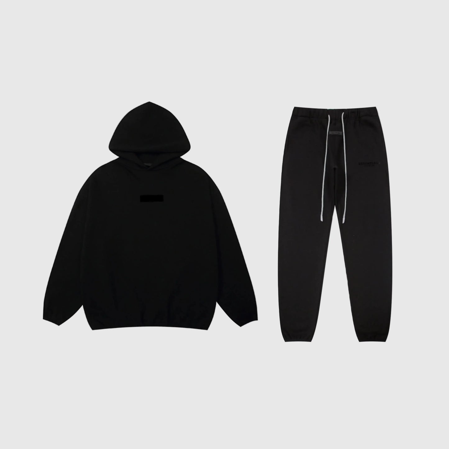 Fear of God Essentials black tracksuit set front view hoodie and joggers