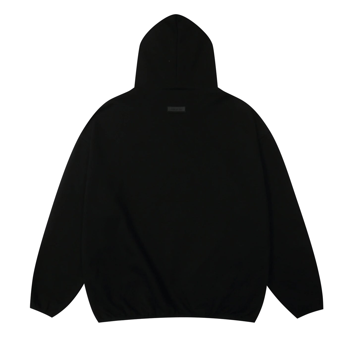 Black Essentials joggers soft-touch rubberized logo on leg close-up