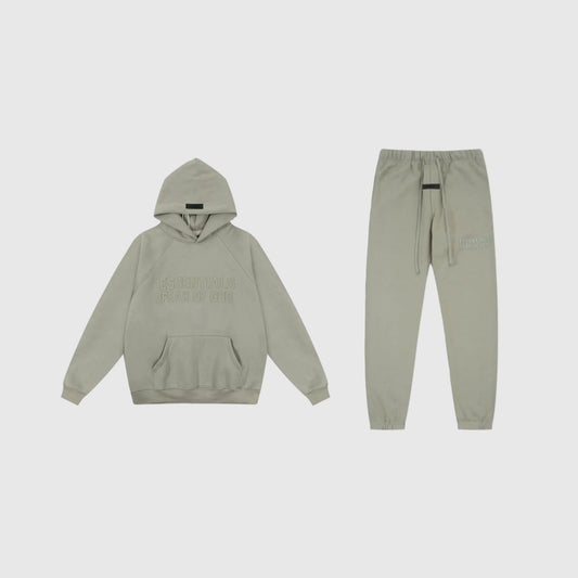 Fear of God Essentials heathered grey tracksuit front view hoodie and joggers