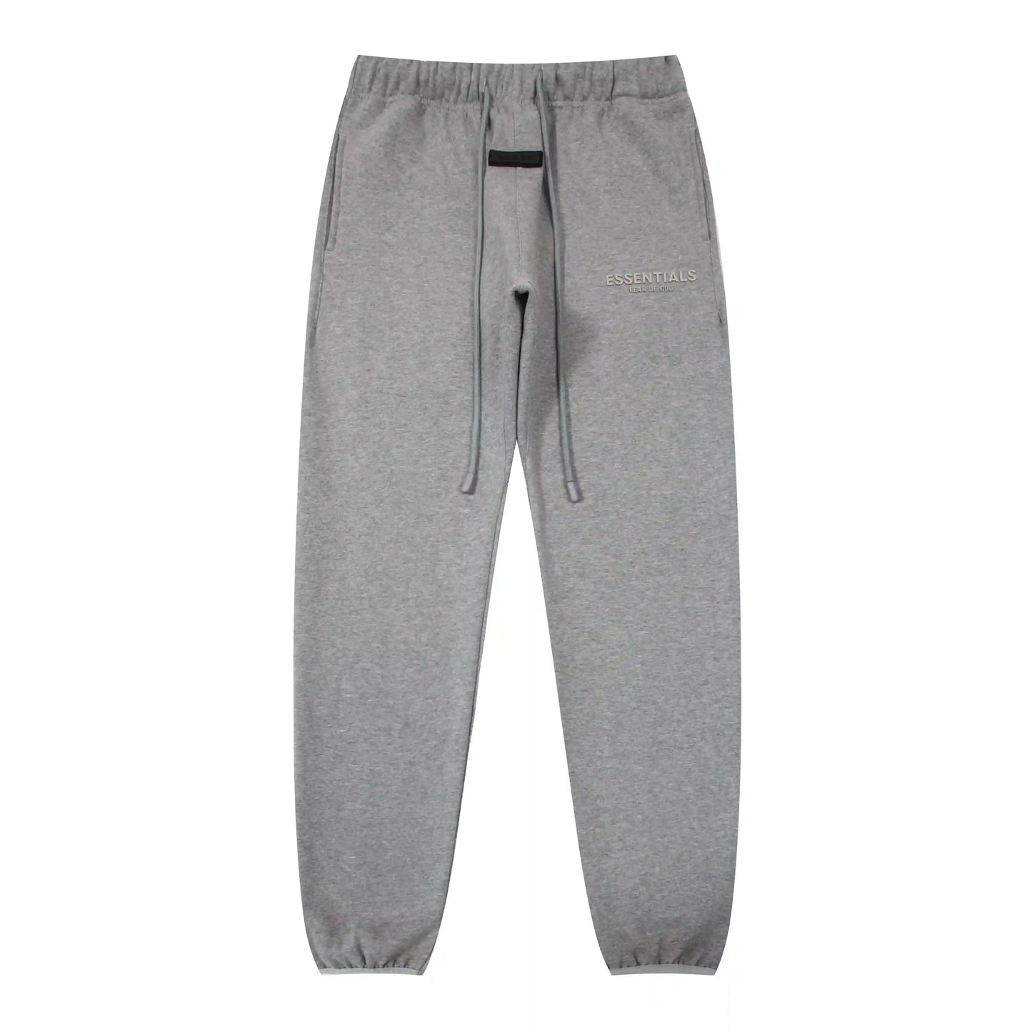 Dark heather oatmeal Essentials joggers soft-touch rubberized logo on leg close-up