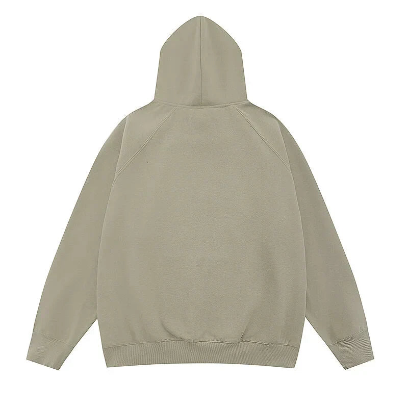 Heathered grey Essentials hood rubberized label detail close-up