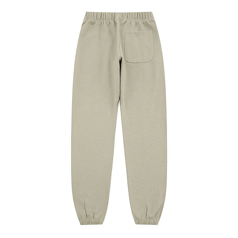 Fear of God Essentials heathered grey tracksuit back view hoodie and joggers