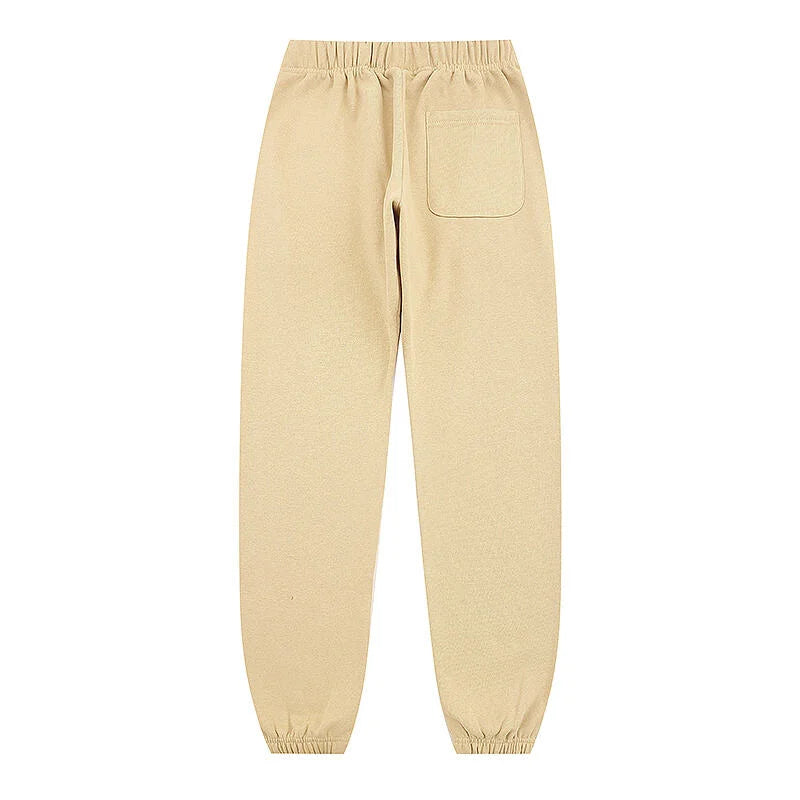 Styled Essentials beige relaxed core fleece tracksuit for everyday casual wear by Fear Of God