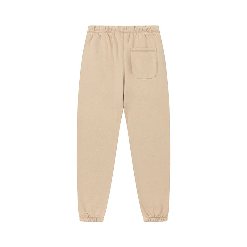 Fear of God Essentials calm shell tracksuit back view hoodie and joggers