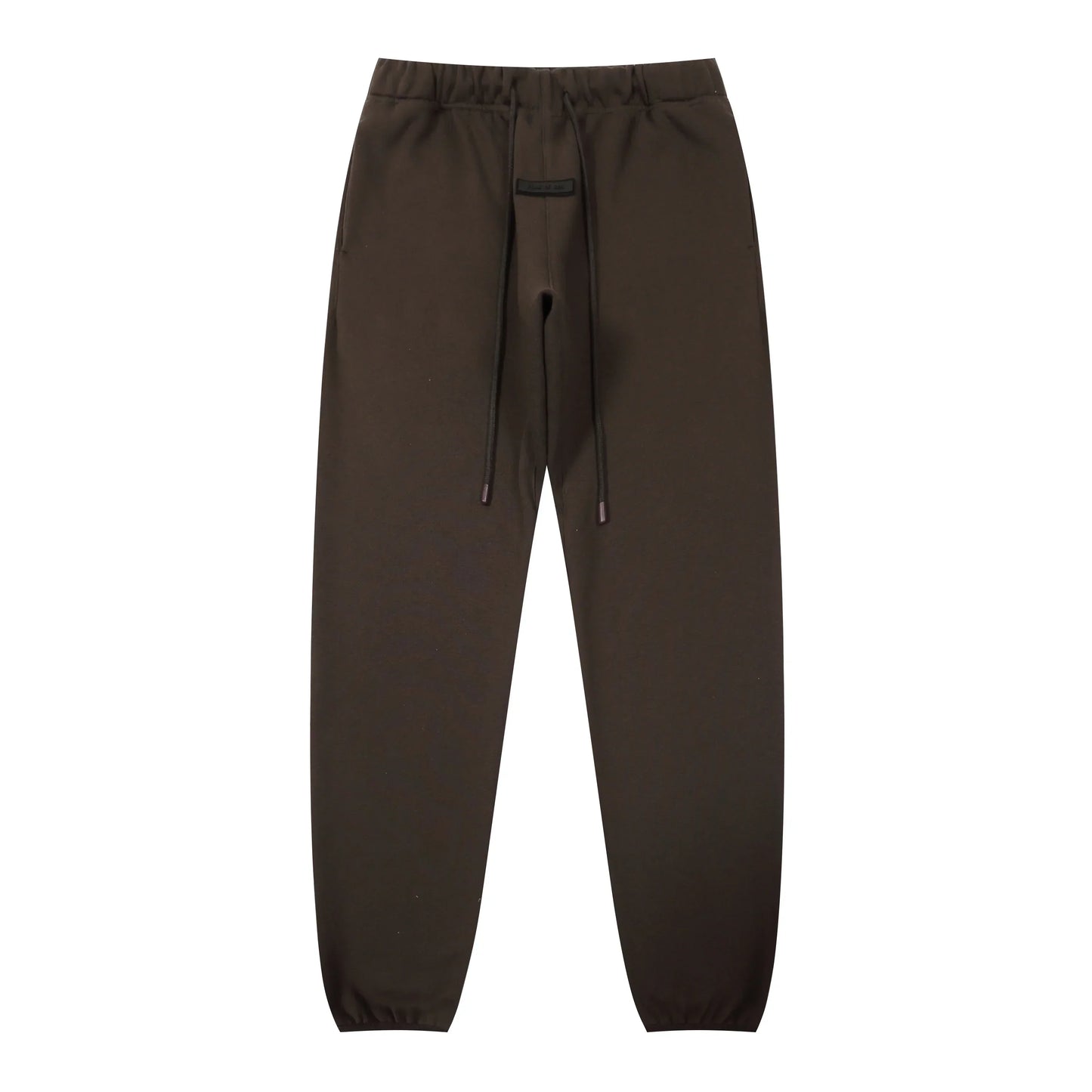 English walnut Essentials joggers soft-touch rubberized logo on leg close-up