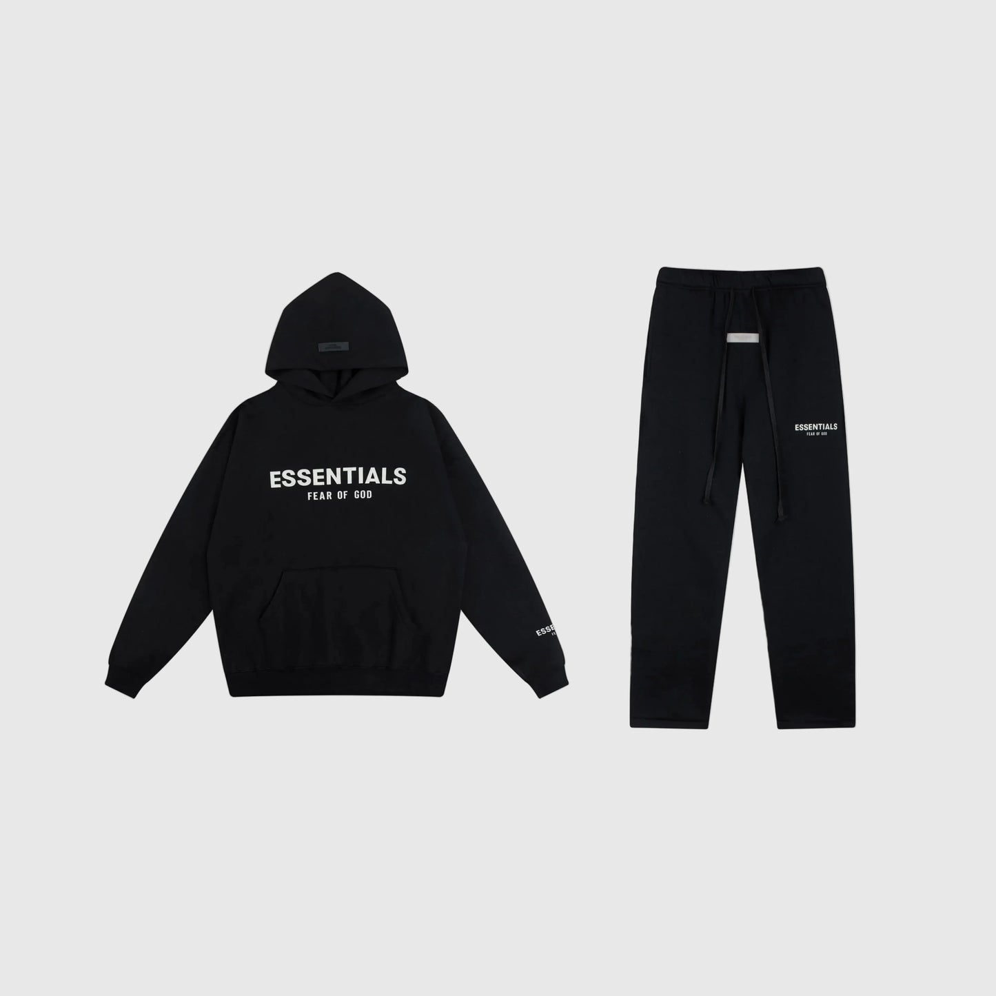 Fear of God Essentials black tracksuit set front view hoodie and joggers