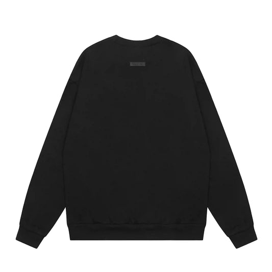 Essentials black sweatshirt back view beveled metallic logo branding