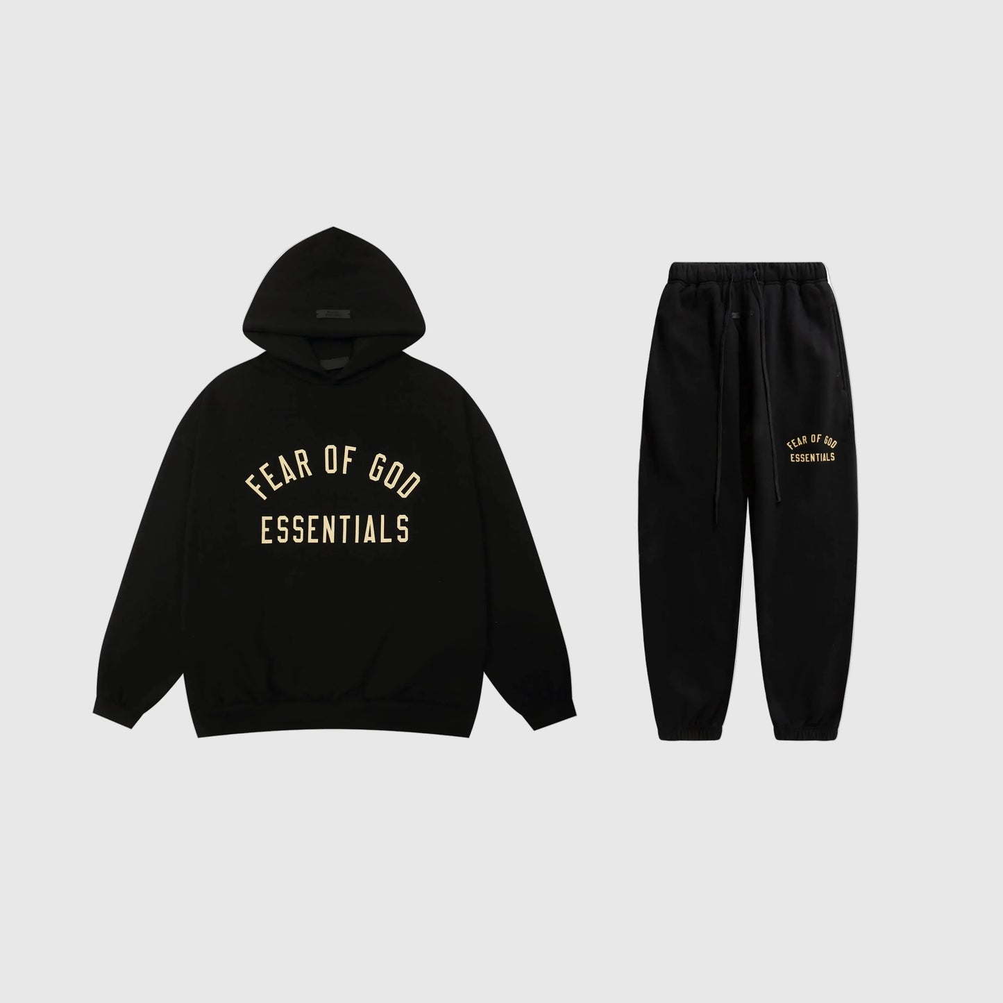 Fear of God Essentials black tracksuit set front view hoodie and joggers
