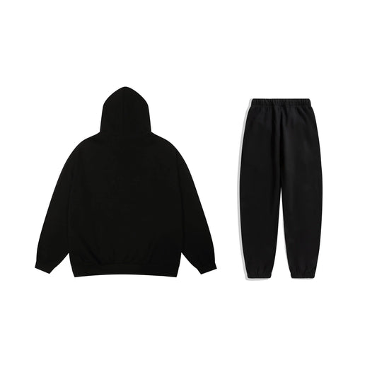 Essentials tracksuit black full set angled view relaxed fit