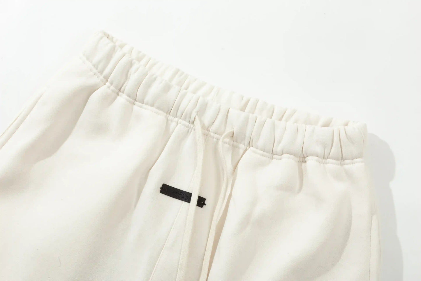 Cloud dance heavyweight fleece fabric texture close-up Essentials tracksuit