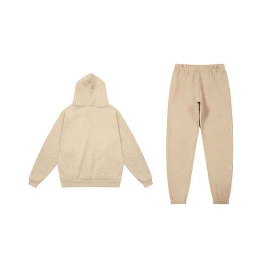 Essentials tracksuit calm shell angled view relaxed fit set