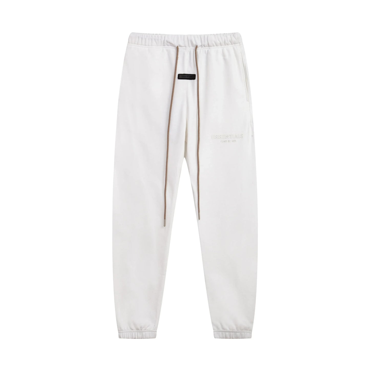 Eggshell Essentials joggers soft-touch rubberized logo on leg close-up