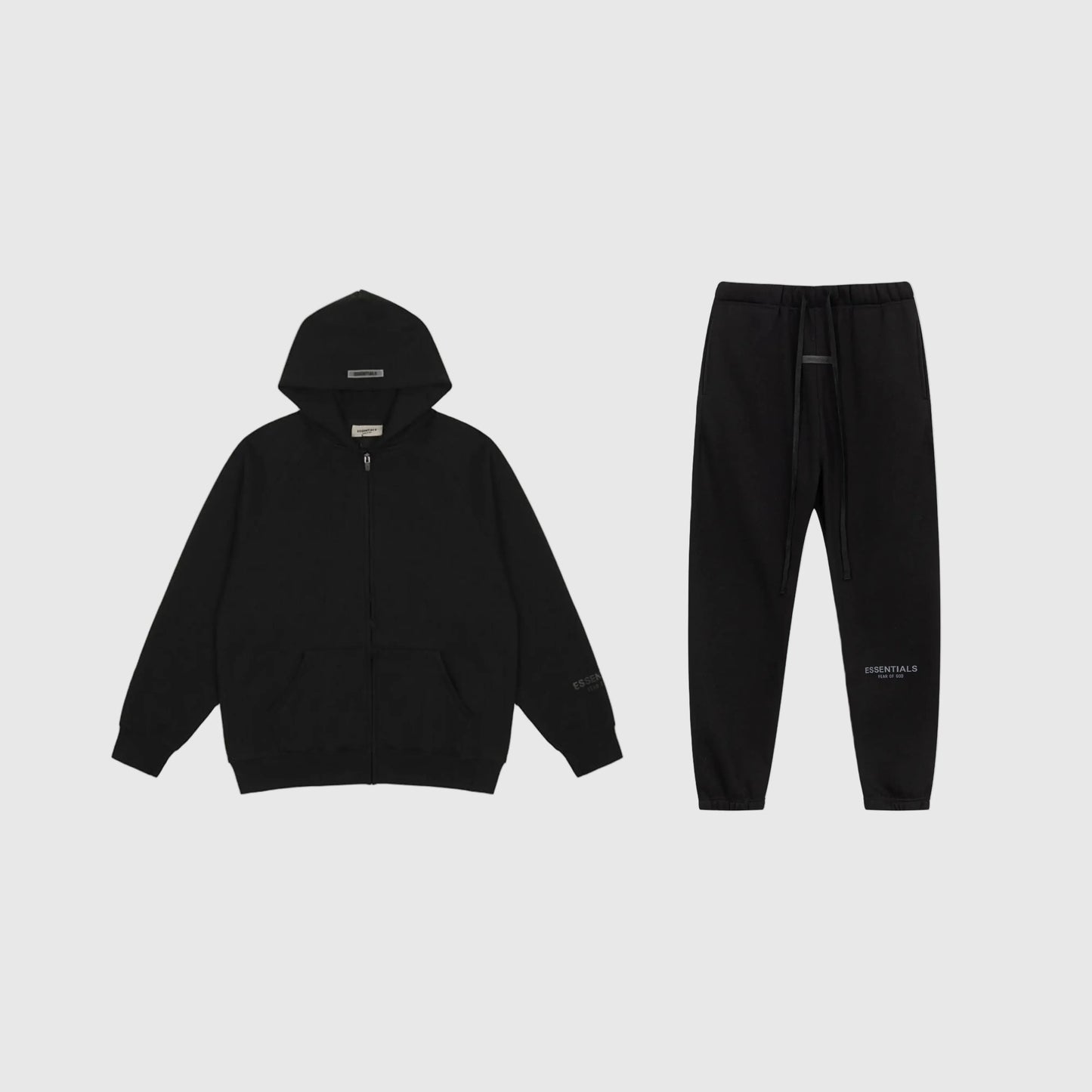 Fear of God Essentials black tracksuit set front view zip hoodie and joggers