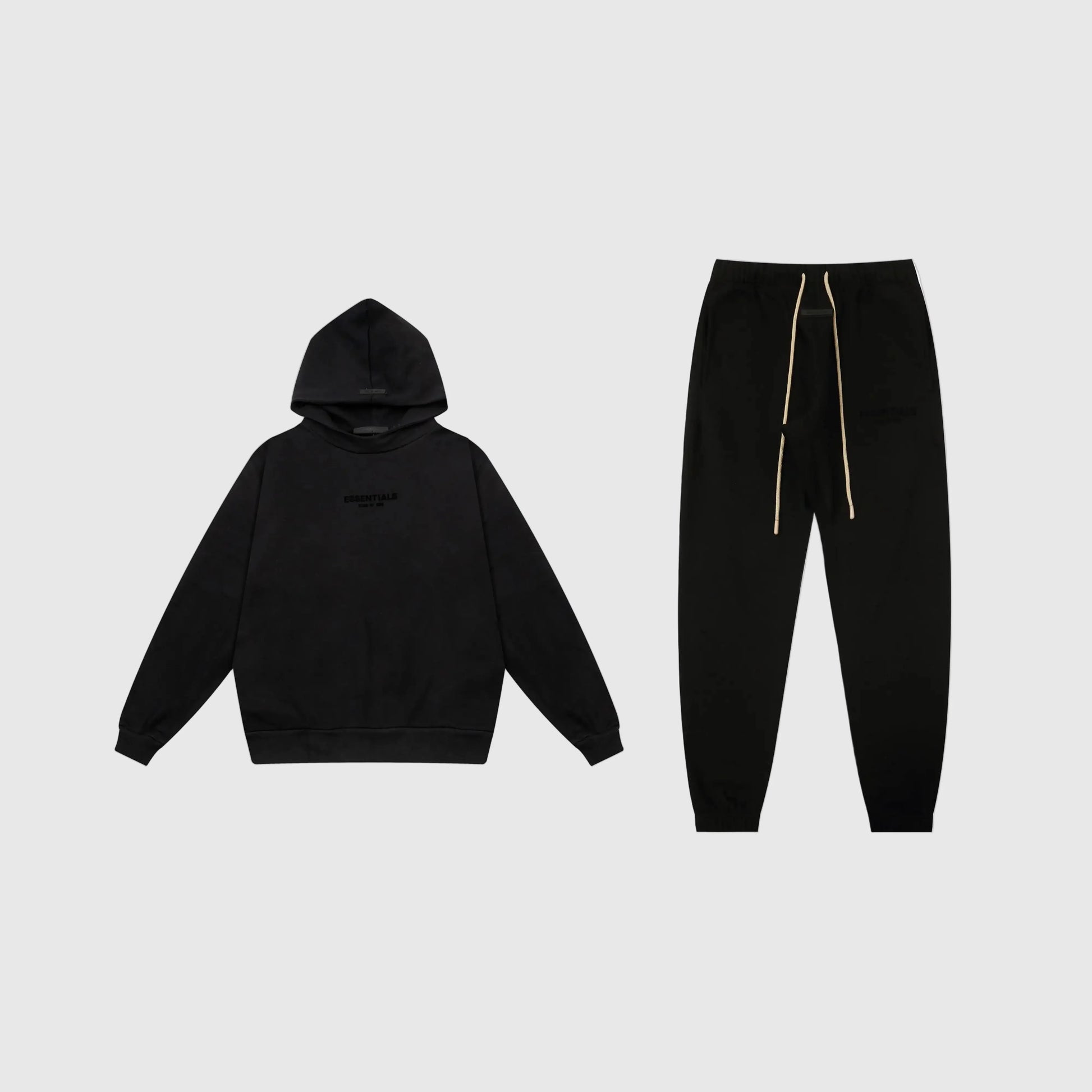 Fear of God Essentials black tracksuit set front view hoodie and joggers