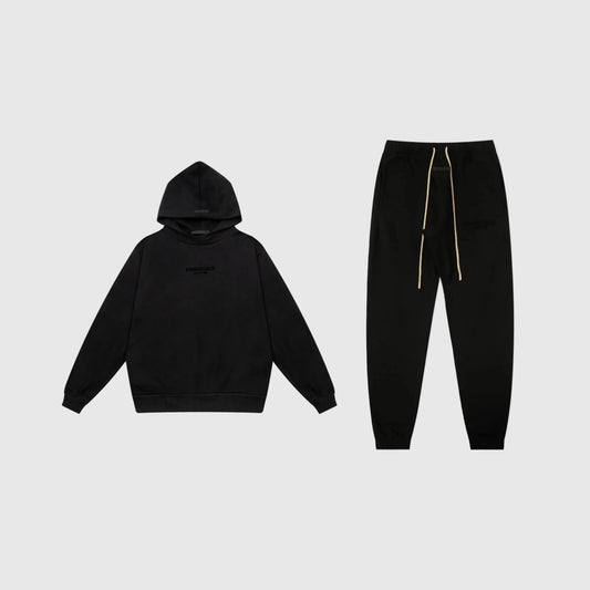 Fear of God Essentials black tracksuit set front view hoodie and joggers