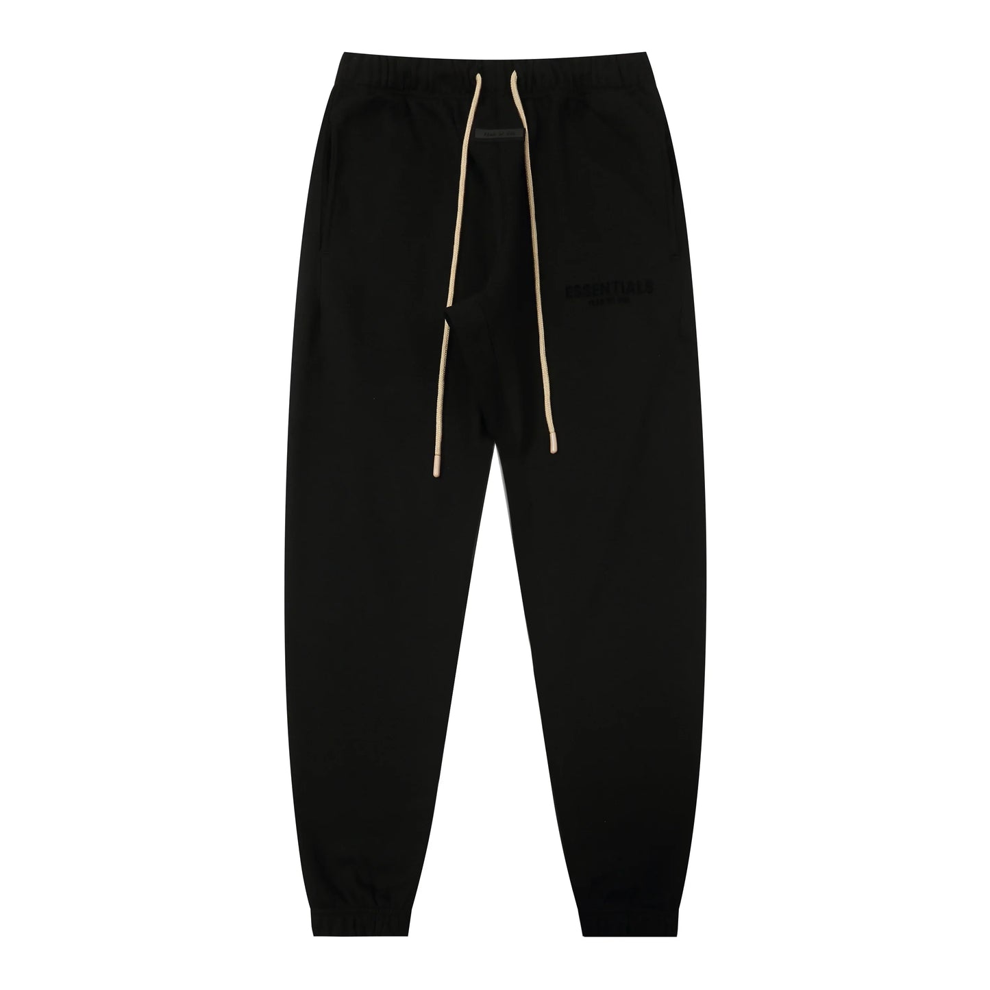 Black Essentials joggers soft-touch rubberized logo on leg close-up